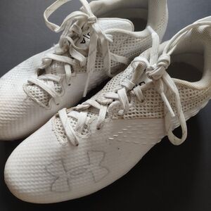 Under Armour football kids shoes size 2.5us